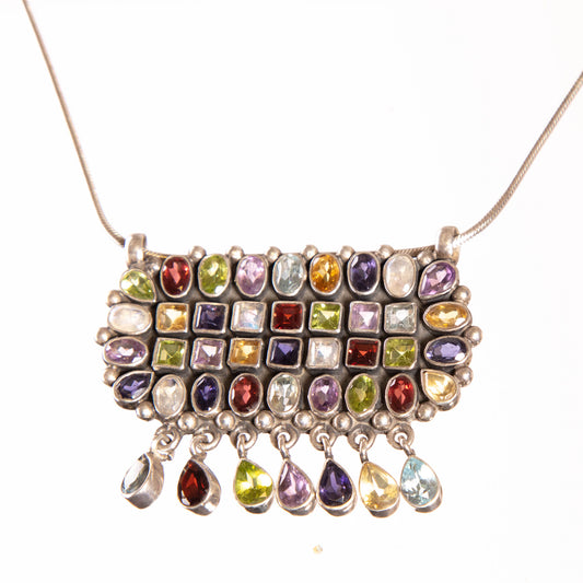 Silver Pendant adorned with semi precious stones.