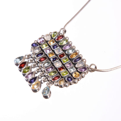 Silver Pendant adorned with semi precious stones.