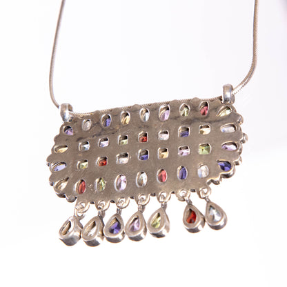 Silver Pendant adorned with semi precious stones.